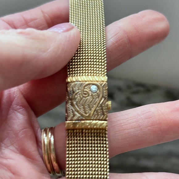 Anne Klein Diamond Collection
Gold Tone Hidden Face Thin
Strap Watch main image 4